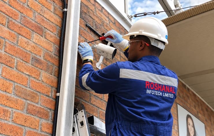 Roshanal Infotech installing a CCTV camera